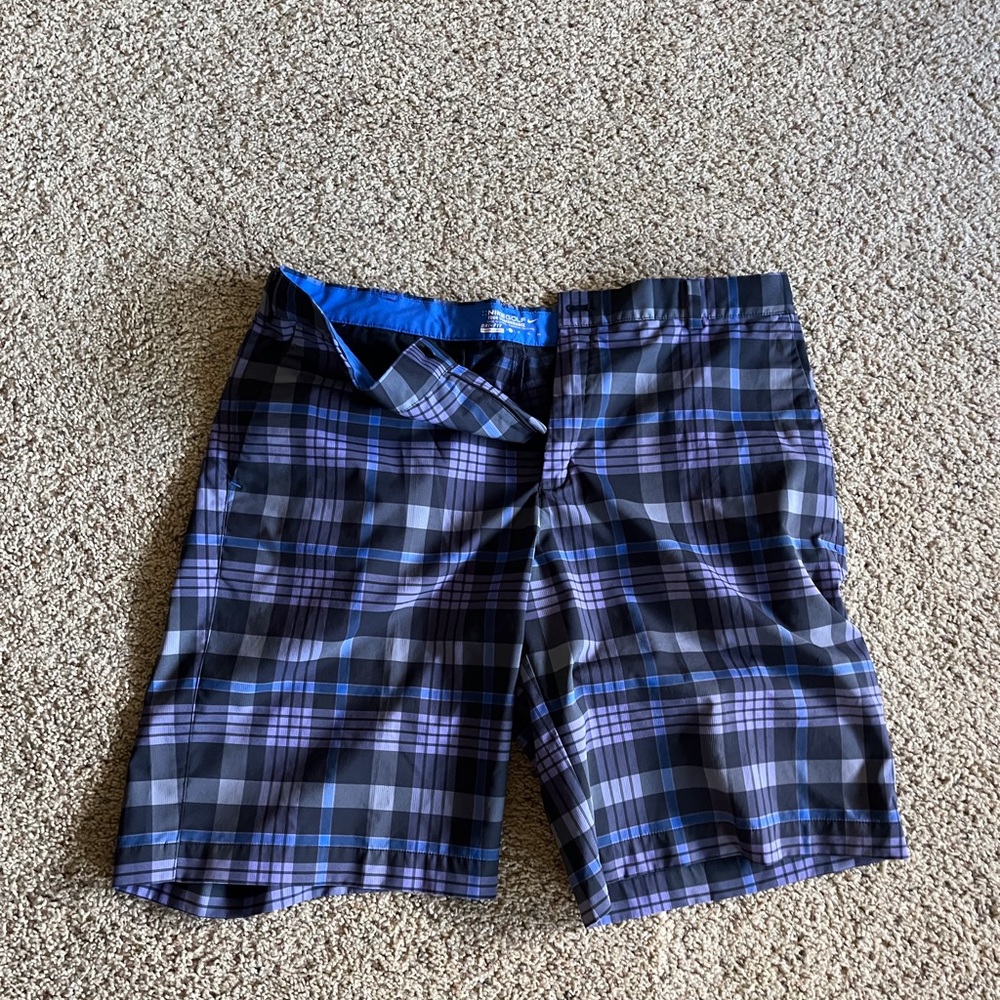 NikeGolf short and Under Armour trousers